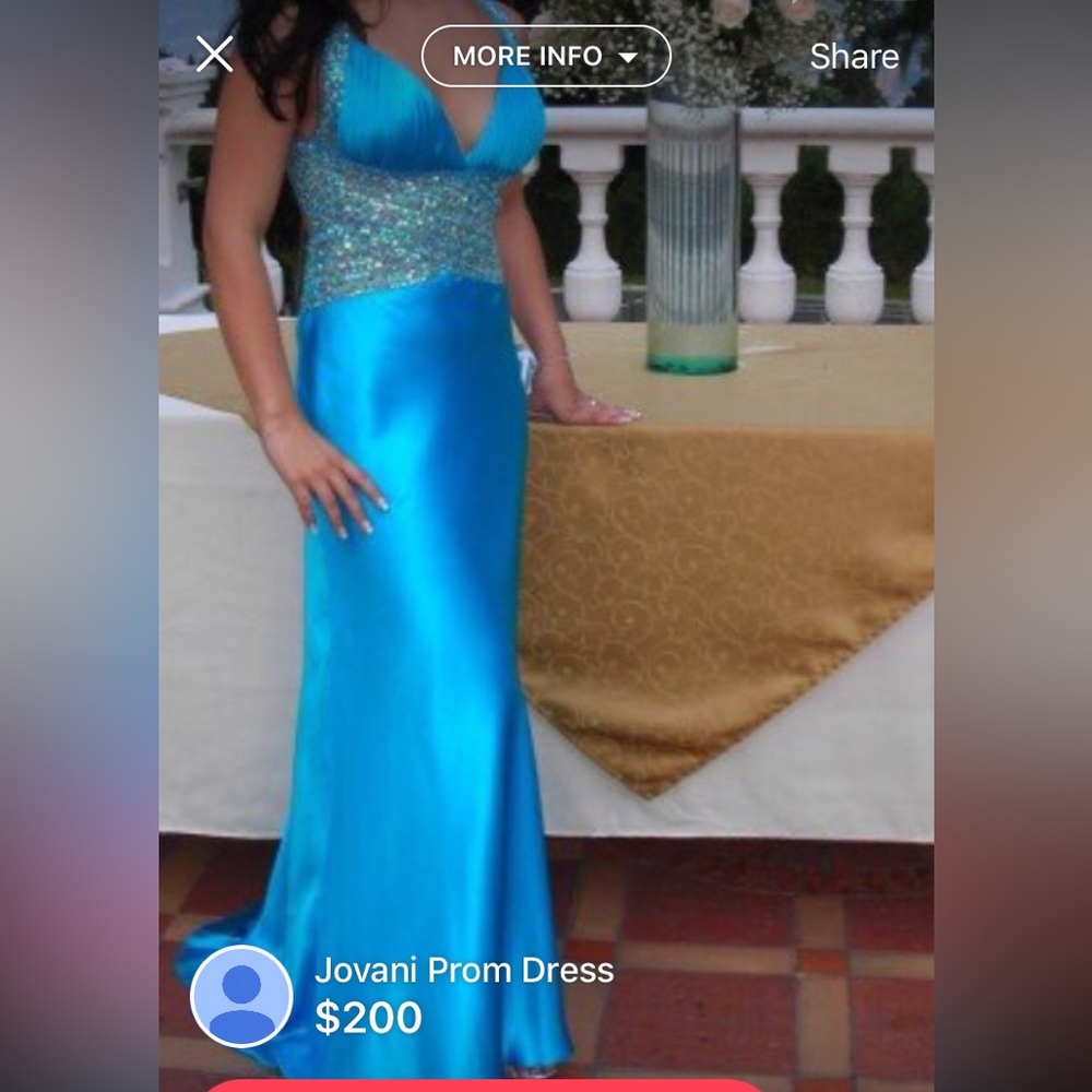 Jovani Beautiful blue dress with silver beading.